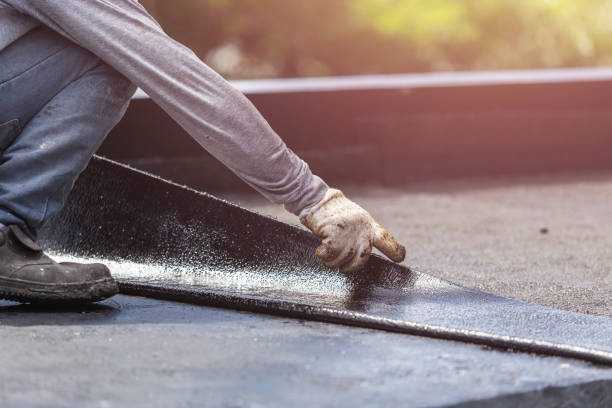 Professional Exterior Waterproofing technician working in Union Springs, NY